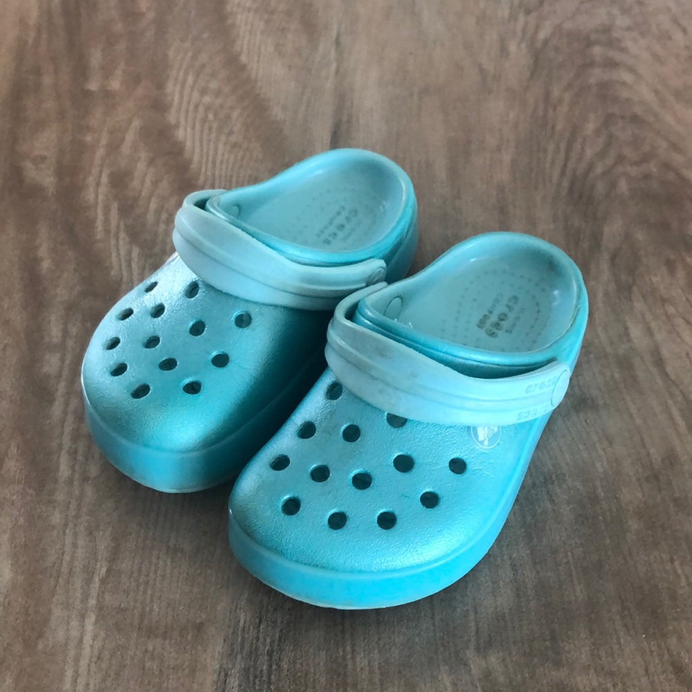 Light blue clogs